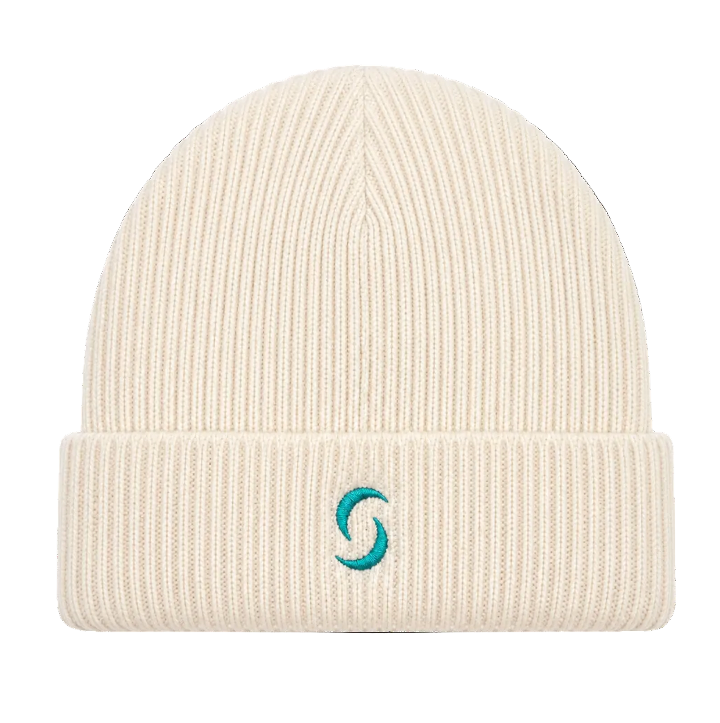 A beige beanie against a white background with the