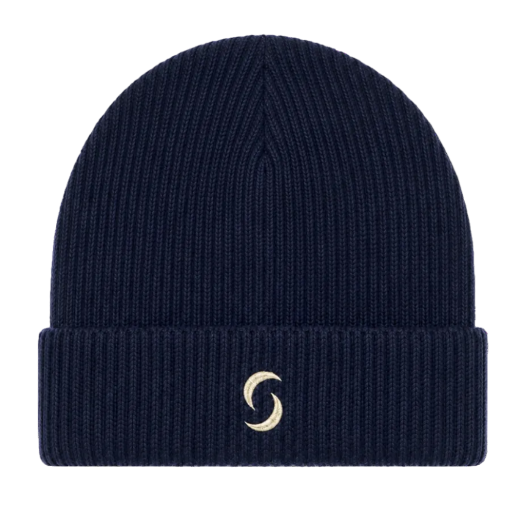 A navy blue beanie against a white background with the