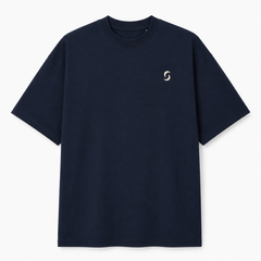 A navy blue shirt against a white background. With the "saltie" logo on it.